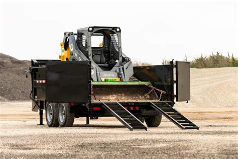 hauling skid steer in dump truck|john deere dump trailer loading.